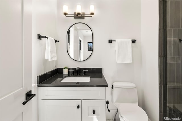 1195 S Milwaukee St, Denver, CO 80210 - bathroom featuring vanity and toilet