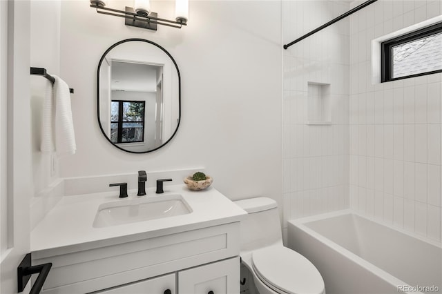 1195 S Milwaukee St, Denver, CO 80210 - bathroom with toilet, vanity, and washtub / shower combination