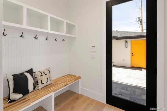1195 S Milwaukee St, Denver, CO 80210 - mudroom featuring baseboards and wood finished floors