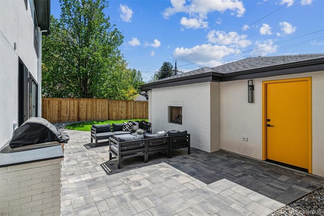 1195 S Milwaukee St, Denver, CO 80210 - view of patio with an outdoor living space and fence