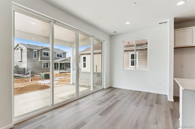 interior space with light hardwood / wood-style flooring