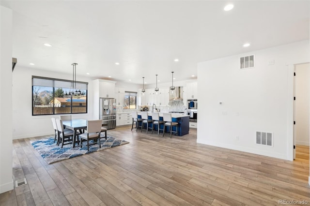 dining area featuring light hardwood / wood-style floors