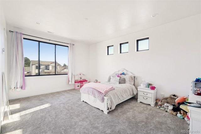 bedroom with light carpet