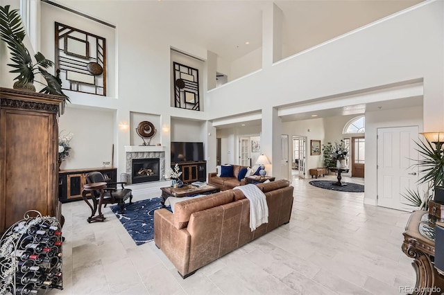 living area featuring a fireplace