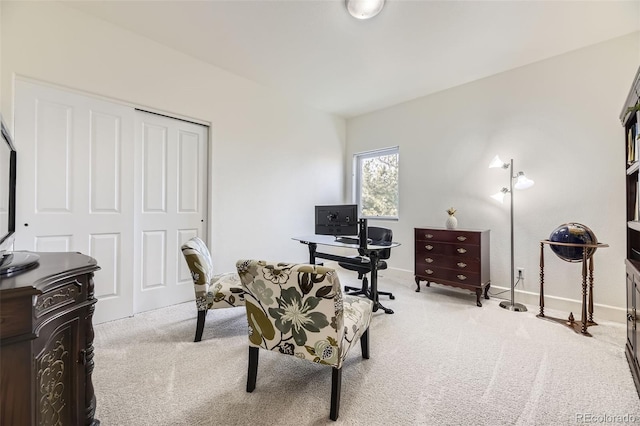 home office featuring carpet flooring and baseboards