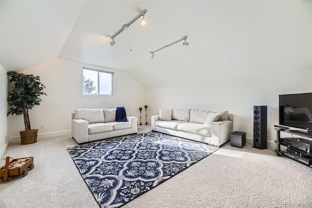 living area with lofted ceiling, carpet flooring, and baseboards