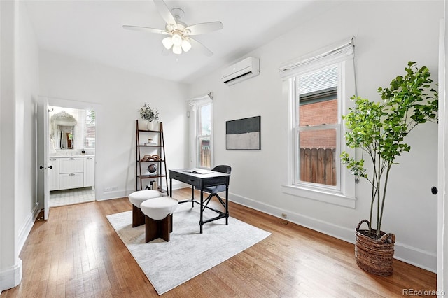 3330 W 30th Ave, Denver, CO 80211 - office area with a wall unit AC, a ceiling fan, light wood-type flooring, and baseboards