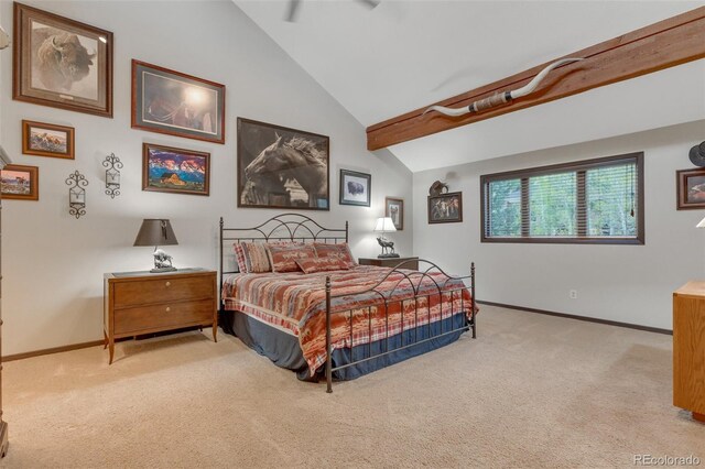 bedroom with carpet floors, ceiling fan, and vaulted ceiling with beams