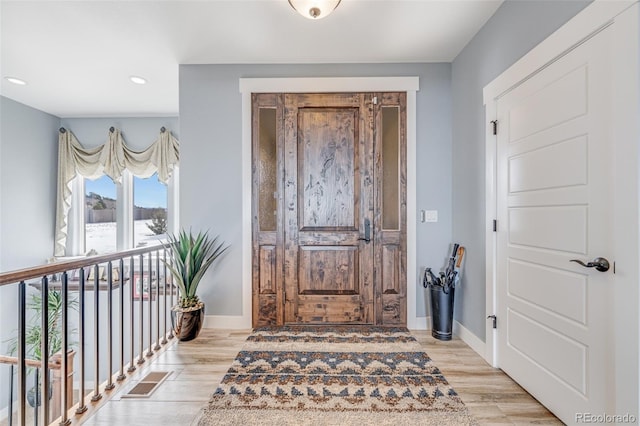 foyer featuring light hardwood / wood-style flooring