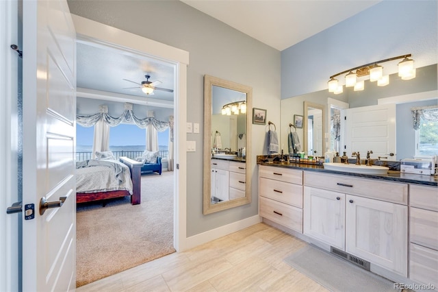 bathroom with vanity and ceiling fan