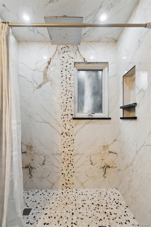 bathroom with a shower with shower curtain