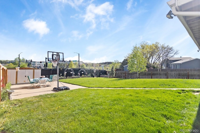 10405 W 107th Pl, Broomfield, CO 80021 - fenced backyard featuring a patio