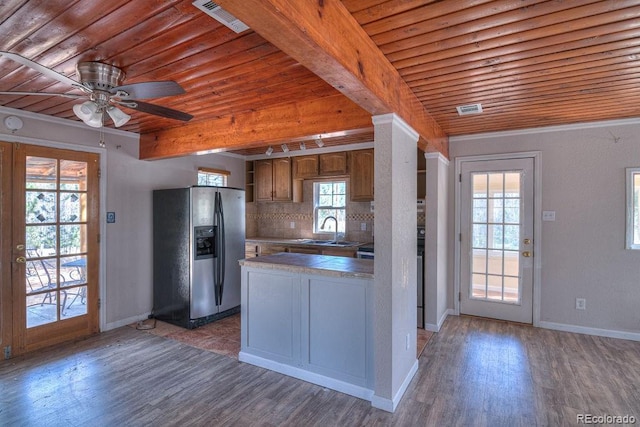 11 Hupp Rd, Bailey, CO 80421 - kitchen with tasteful backsplash, light wood-style flooring, a sink, and stainless steel refrigerator with ice dispenser
