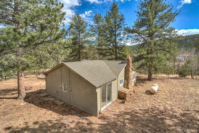 11 Hupp Rd, Bailey, CO 80421 - view of side of home with a shingled roof