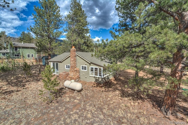 11 Hupp Rd, Bailey, CO 80421 - view of side of property with a chimney