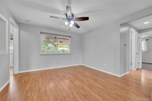3463 W Bowles Ave, Littleton, CO 80123 - empty room featuring light wood-style floors and ceiling fan