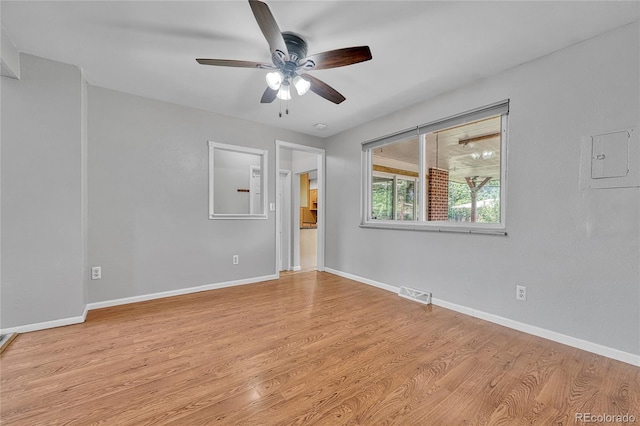 3463 W Bowles Ave, Littleton, CO 80123 - empty room featuring ceiling fan and wood finished floors