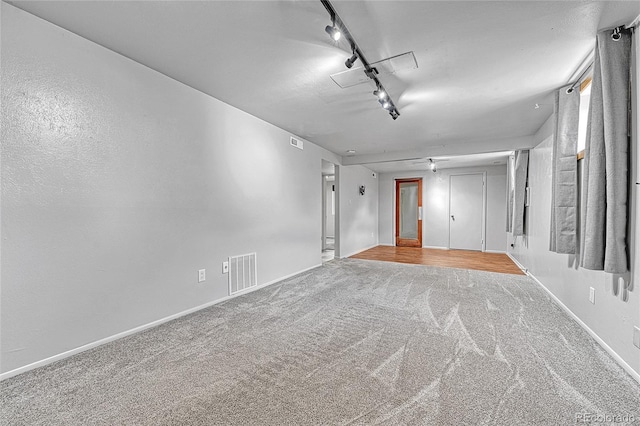 3463 W Bowles Ave, Littleton, CO 80123 - spare room featuring carpet and rail lighting
