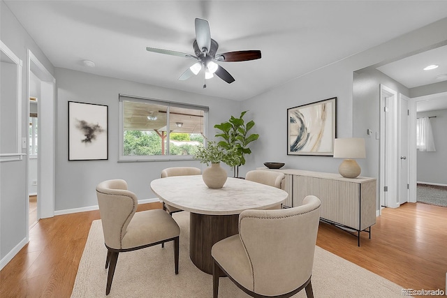 3463 W Bowles Ave, Littleton, CO 80123 - dining area with wood finished floors and ceiling fan