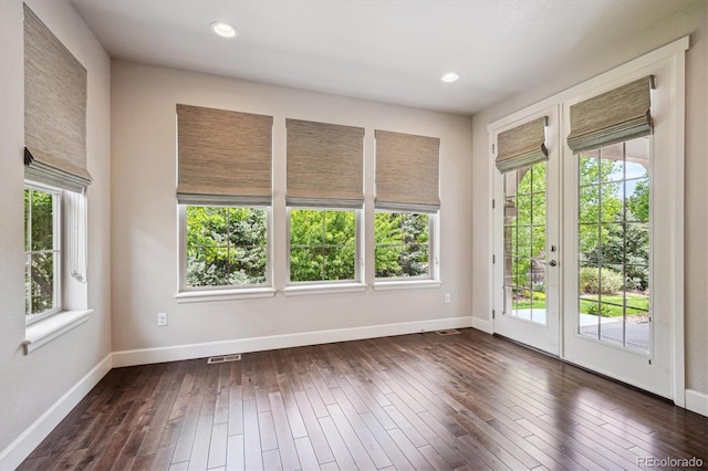 2264 S Joyce St, Lakewood, CO 80228 - spare room with baseboards, dark wood-style floors, and recessed lighting