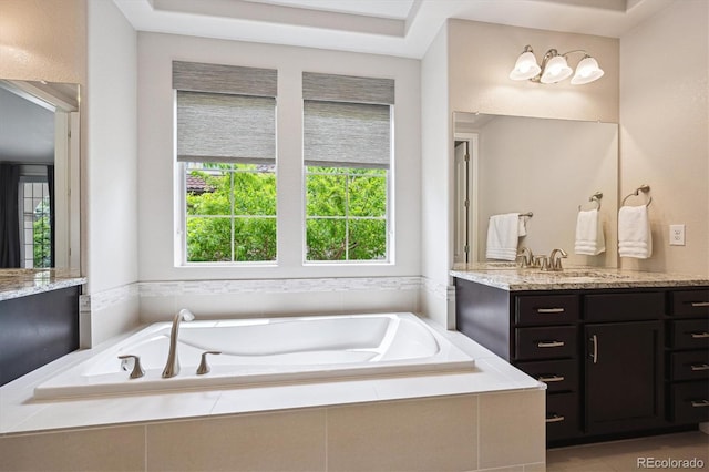 2264 S Joyce St, Lakewood, CO 80228 - bathroom with vanity and a bath