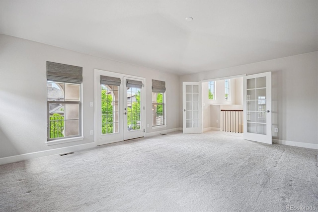 2264 S Joyce St, Lakewood, CO 80228 - unfurnished room with french doors, baseboards, and carpet