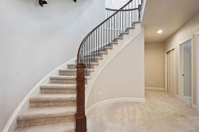 2264 S Joyce St, Lakewood, CO 80228 - staircase featuring carpet, baseboards, and recessed lighting