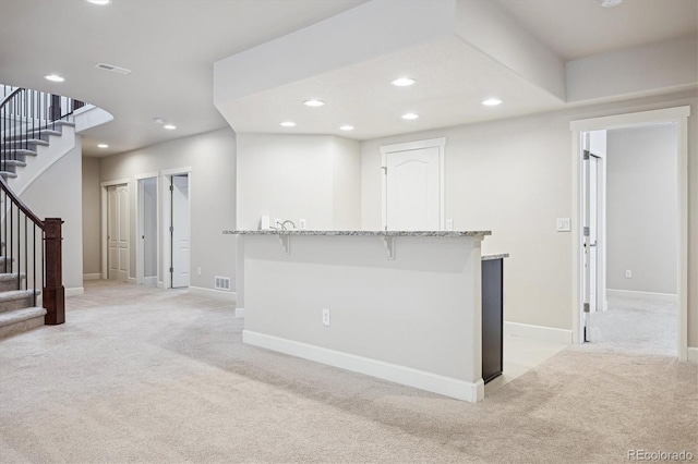 2264 S Joyce St, Lakewood, CO 80228 - bar area with light carpet, stairs, recessed lighting, and baseboards