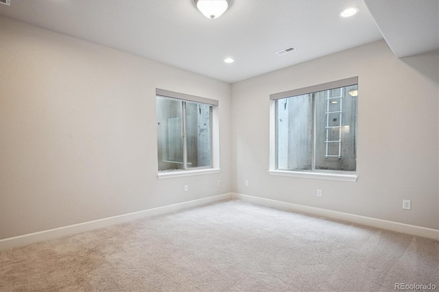 2264 S Joyce St, Lakewood, CO 80228 - carpeted empty room featuring baseboards and recessed lighting