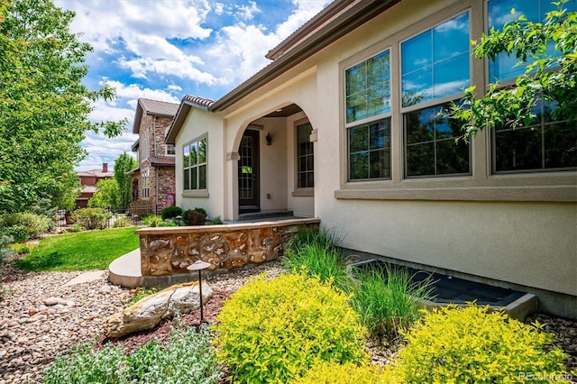 2264 S Joyce St, Lakewood, CO 80228 - view of side of home with stucco siding