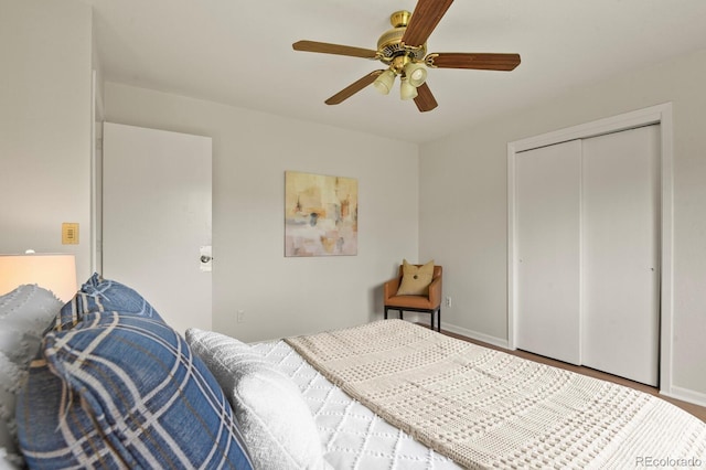 30221 Stagecoach Blvd, Evergreen, CO 80439 - bedroom with a closet, a ceiling fan, and baseboards