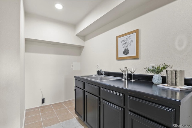 30221 Stagecoach Blvd, Evergreen, CO 80439 - laundry room with a sink and light tile patterned flooring