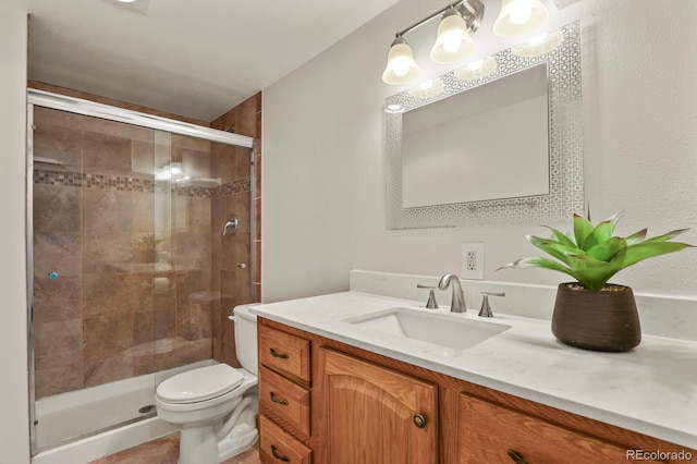 30221 Stagecoach Blvd, Evergreen, CO 80439 - bathroom featuring vanity, a stall shower, and toilet