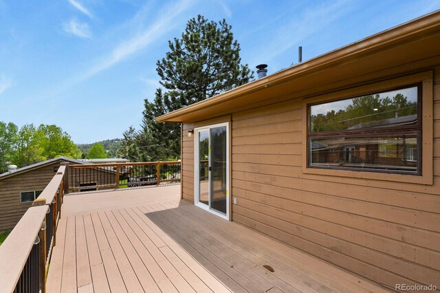 30221 Stagecoach Blvd, Evergreen, CO 80439 - view of wooden deck