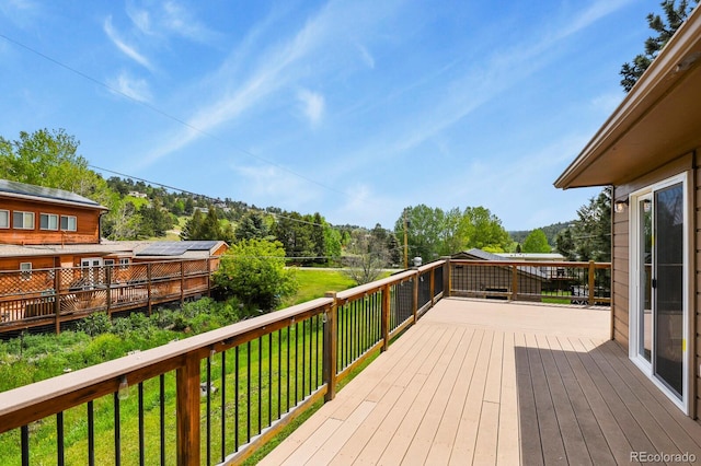 30221 Stagecoach Blvd, Evergreen, CO 80439 - wooden terrace featuring a yard
