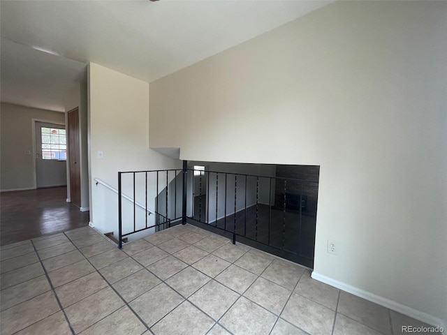 empty room featuring light tile flooring