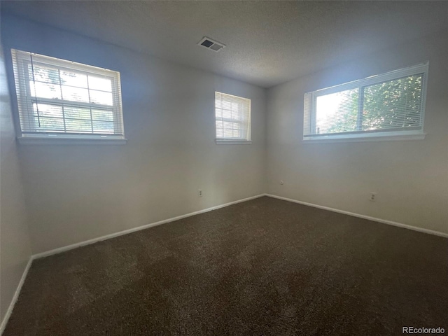 spare room with carpet flooring