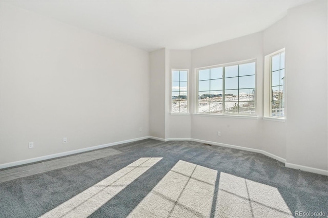 view of carpeted spare room