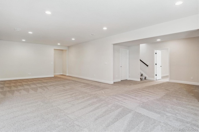 basement with light carpet