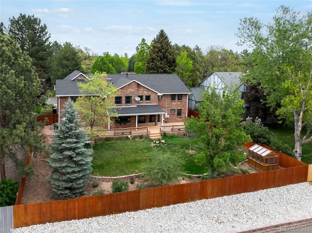 rear view of house with brick siding