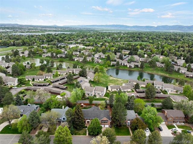 aerial view of residential area with a water and mountain view