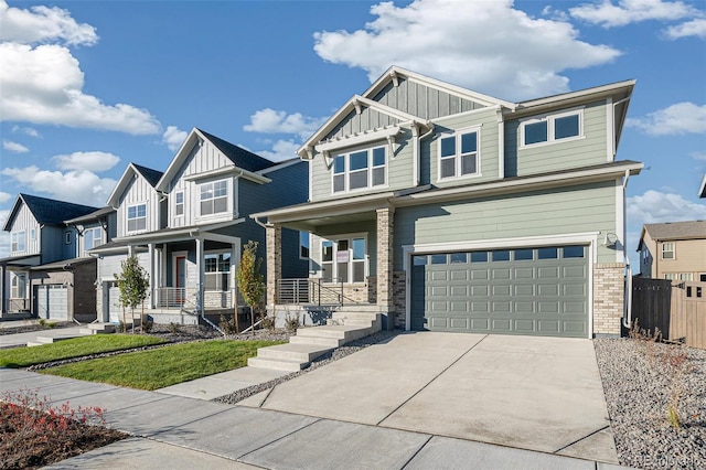 craftsman-style house with a porch and a garage