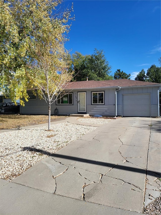 single story home with a garage