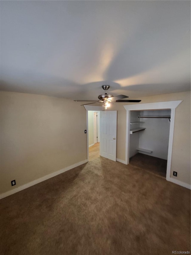 unfurnished bedroom featuring carpet flooring, a closet, and ceiling fan