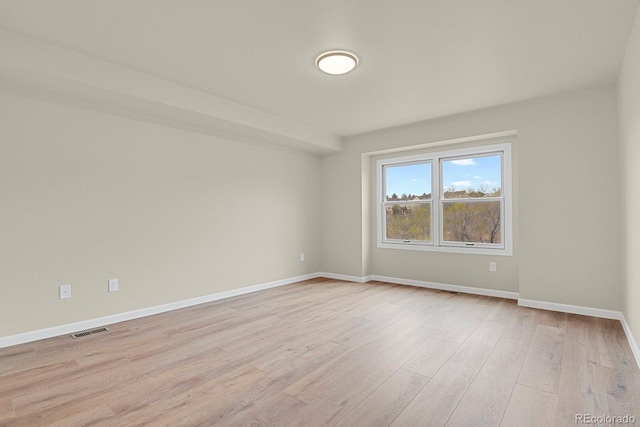 2866 Tenderfoot Hill St, Colorado Springs, CO 80906 - spare room featuring baseboards, light wood-style flooring, and visible vents