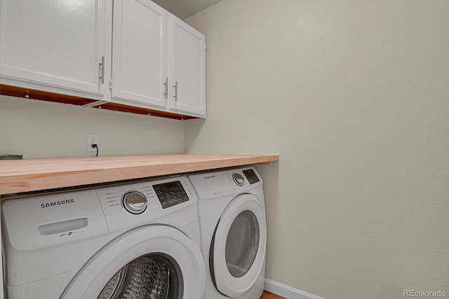 2866 Tenderfoot Hill St, Colorado Springs, CO 80906 - laundry area with washer and dryer, baseboards, and cabinet space