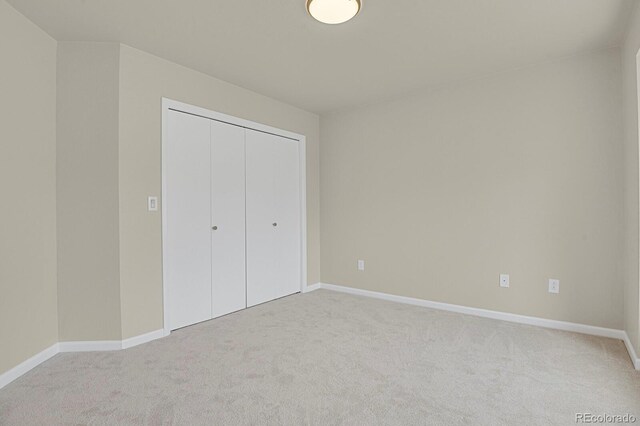 2866 Tenderfoot Hill St, Colorado Springs, CO 80906 - unfurnished bedroom with light carpet, a closet, and baseboards