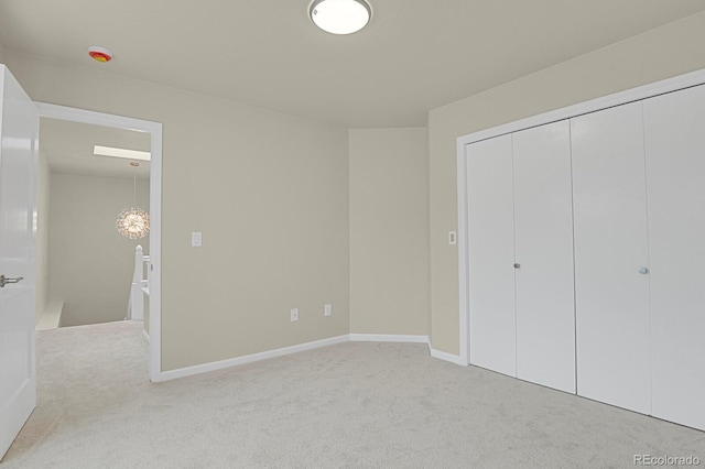 2866 Tenderfoot Hill St, Colorado Springs, CO 80906 - unfurnished bedroom with baseboards, a closet, and carpet