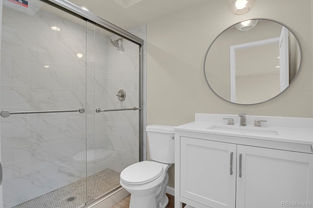 2866 Tenderfoot Hill St, Colorado Springs, CO 80906 - bathroom featuring toilet, vanity, and a marble finish shower