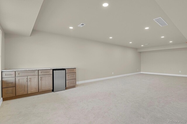 2866 Tenderfoot Hill St, Colorado Springs, CO 80906 - basement featuring recessed lighting, fridge, and visible vents